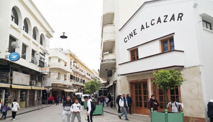 a group of people walking down a city street at Best of Tangiers Heart in Tangier