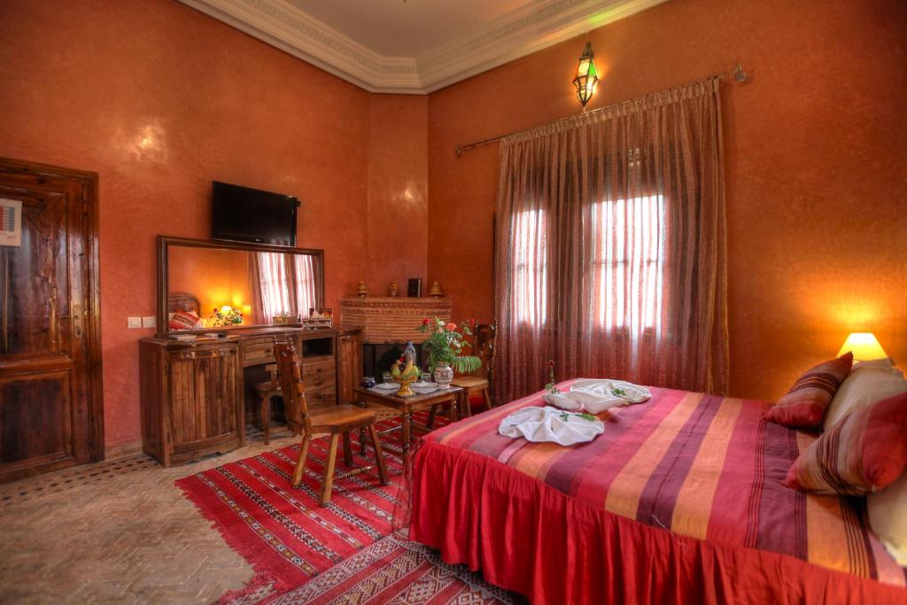 Postel nebo postele na pokoji v ubytování Villa Dar Mya Palmiers