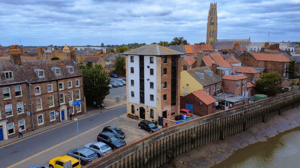 a city with cars parked on a bridge at Warehouse in Boston