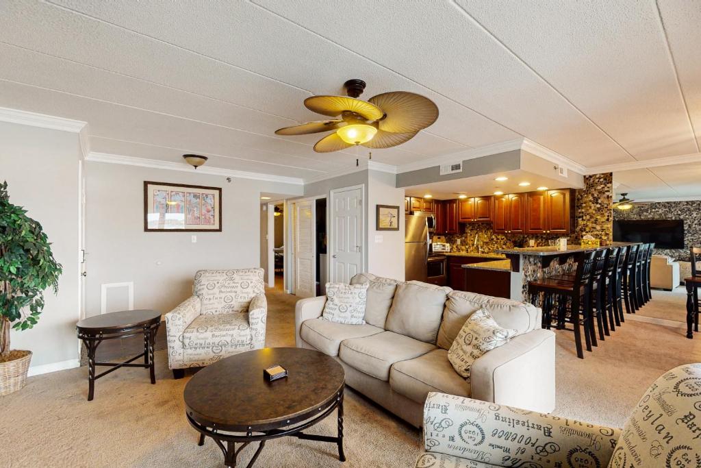 a living room with a couch and a table at White Marlin 208B in Ocean City