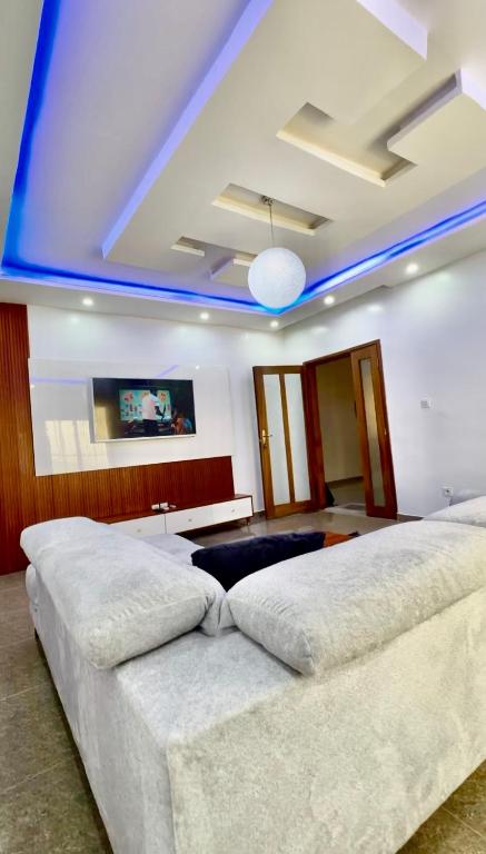 Una cama o camas en una habitación de Afam Group