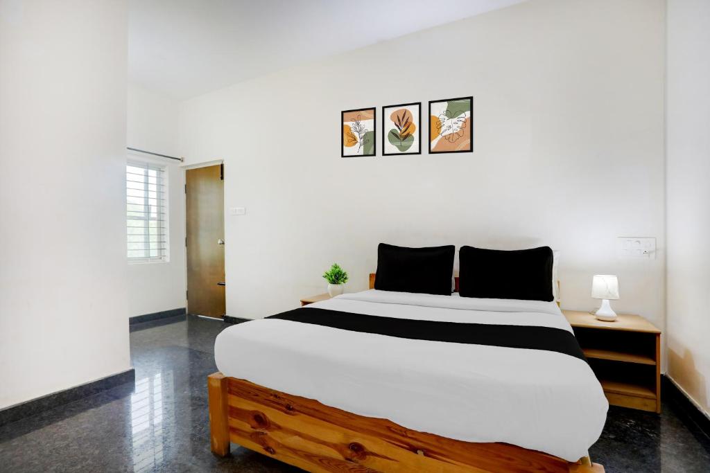 Ένα ή περισσότερα κρεβάτια σε δωμάτιο στο Hotel O 1 LEGACY INN