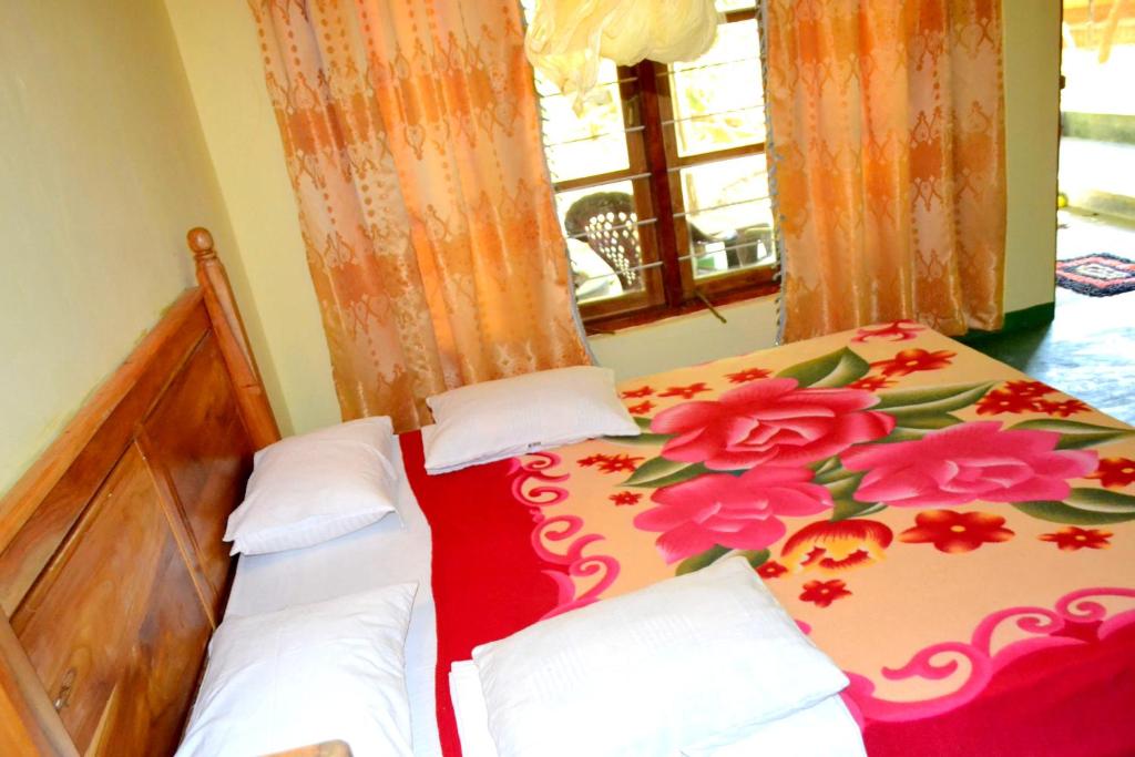 Postel nebo postele na pokoji v ubytování Sigiriya Freedom Lodge