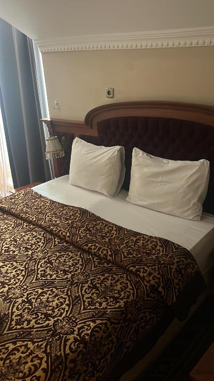 Postel nebo postele na pokoji v ubytování Pierre hostel