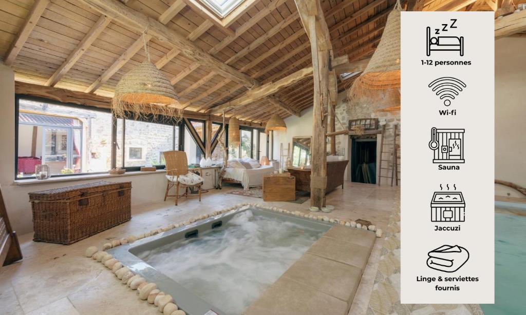 a villa with a swimming pool in a house at Campagne Médicis Piscine, jacuzzi & sauna privés in Juré