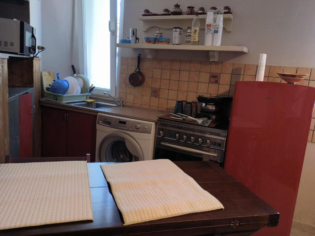 Kuchyň nebo kuchyňský kout v ubytování dolcecasa77