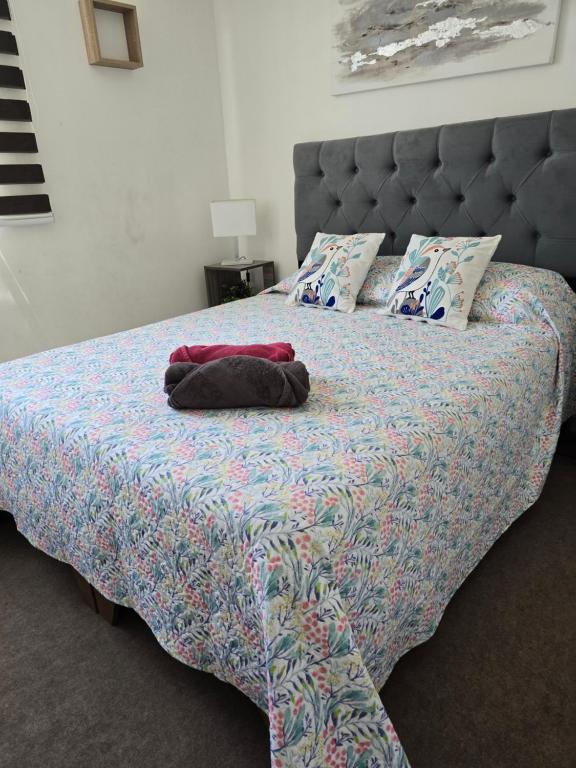 Katil atau katil-katil dalam bilik di Departamento 3 dorm en Condominio privado