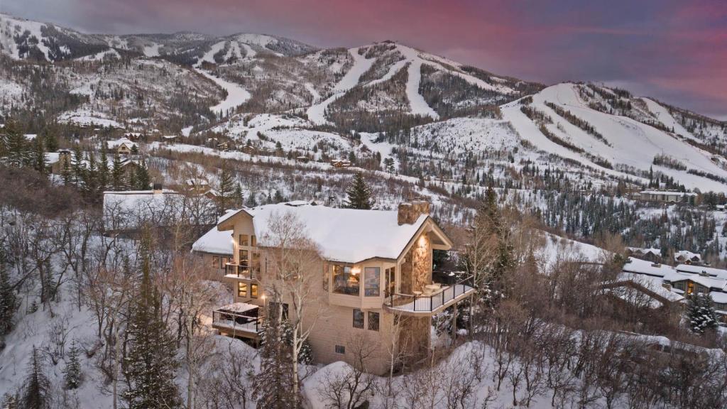 an aerial view of a house in the snow at Glacier Lodge - West in Steamboat Springs