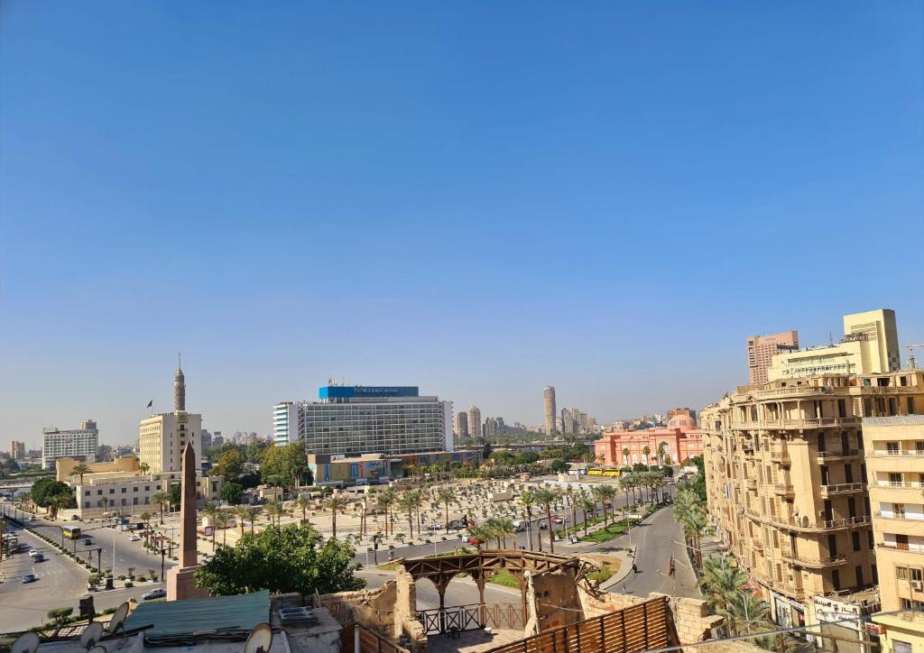 Nespecifikovaný výhled na destinaci Káhira nebo výhled na město při pohledu z apartmánu
