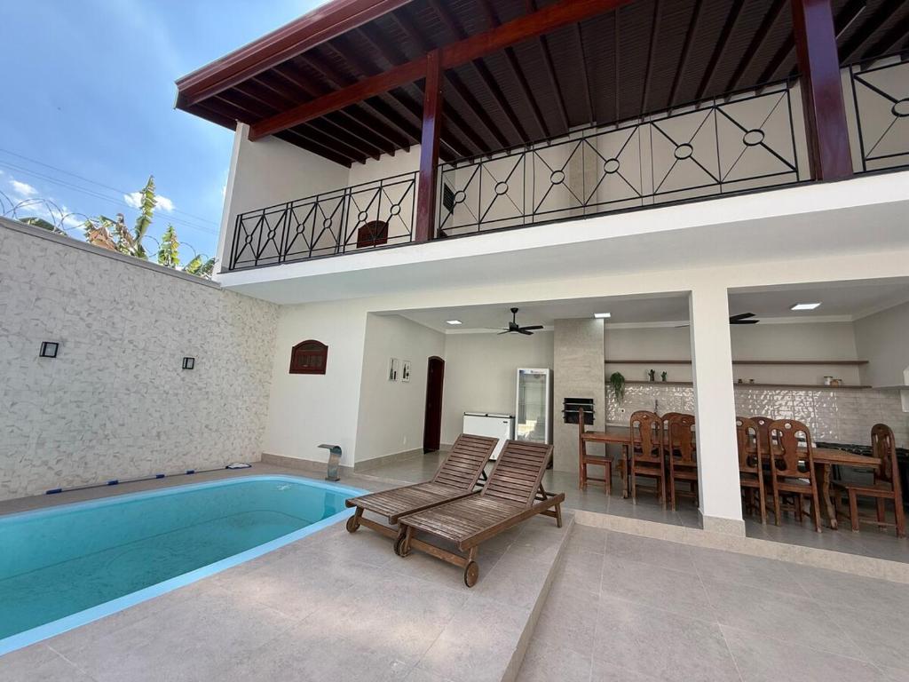 Bazén v ubytování Casa Confortavel e Ampla em Americana - com Piscina Churrasqueira Wifi nebo v jeho okolí