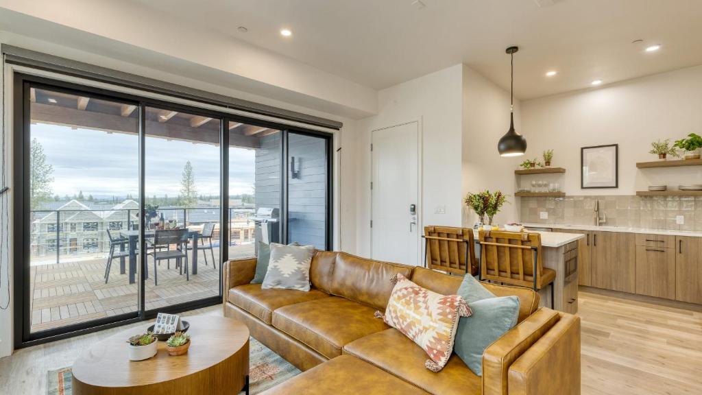 a living room with a couch and a table at 2 Units Minutes to Downtown Bend Hot Tub 1208 Skyline Ranch by AvantStay in Bend