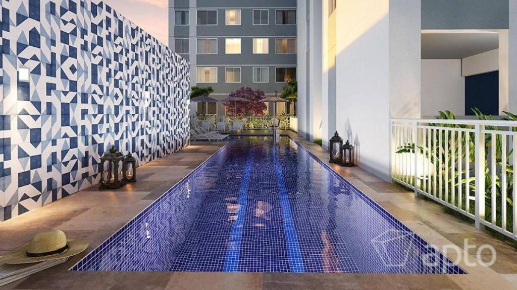 a swimming pool in the middle of a building at Linkin Home Mapp Rio Branco in Sao Paulo