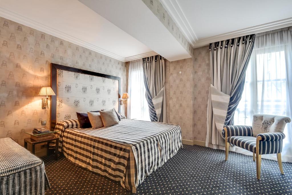 Voodi või voodid majutusasutuse Villa Lutèce Port Royal toas