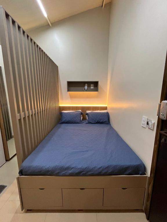 Ένα ή περισσότερα κρεβάτια σε δωμάτιο στο Apartamento Loft 3 próximo ao Shopping