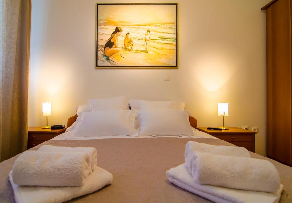 Posteľ alebo postele v izbe v ubytovaní Harmony Apartment