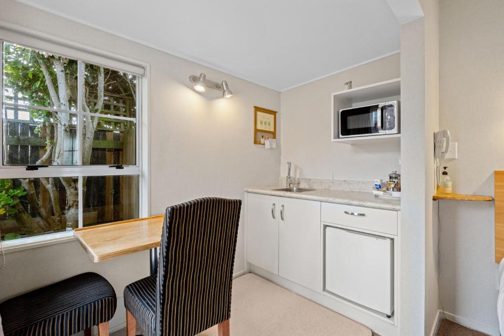 Cottage Mews Motel - Resim 37