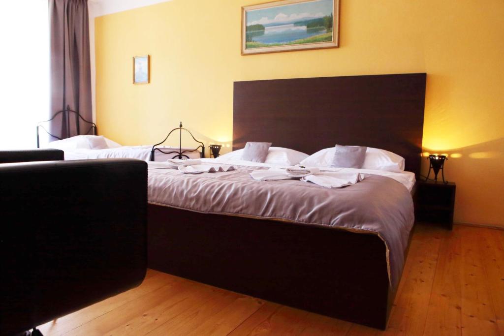 Postel nebo postele na pokoji v ubytování Hotel U Martina