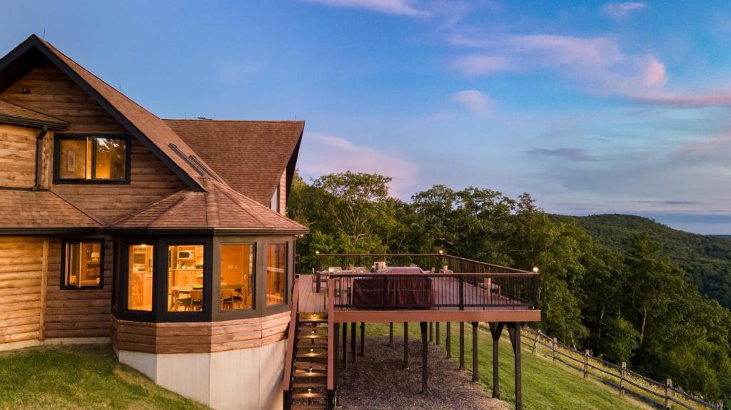 a house with a deck with a view of the mountains at Chester by AvantStay Amazing Views Secluded Home A True City Escape in Austerlitz