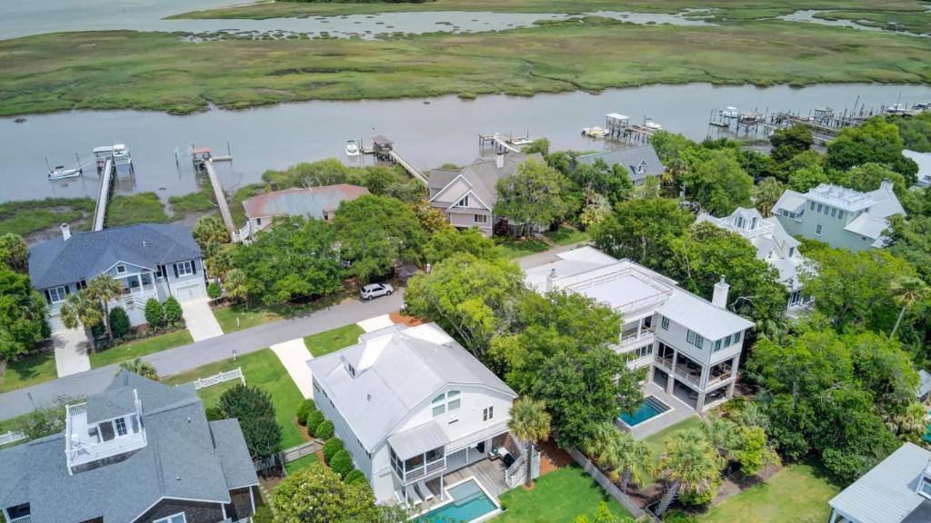 an aerial view of a home and a house at Be a Sullivans Local 1307 Cove Avenue by AvantStay Pool Outdoor Living in Sullivans Island