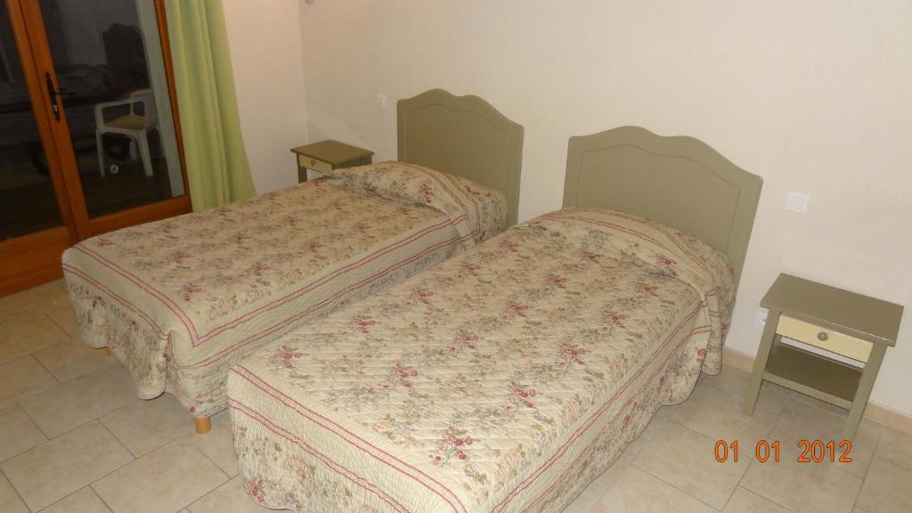 Postel nebo postele na pokoji v ubytování Auberge de la Fadaise