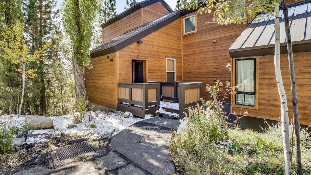 a house in the woods with a stove at Pinegrove by AvantStay Beautiful Villas Condo just outside Tahoe City in Dollar Point