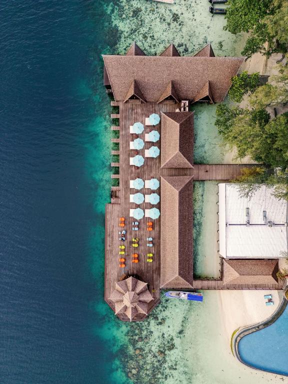 an aerial view of a resort in the water at Sepa Island Resort in Pulau Tondan Barat
