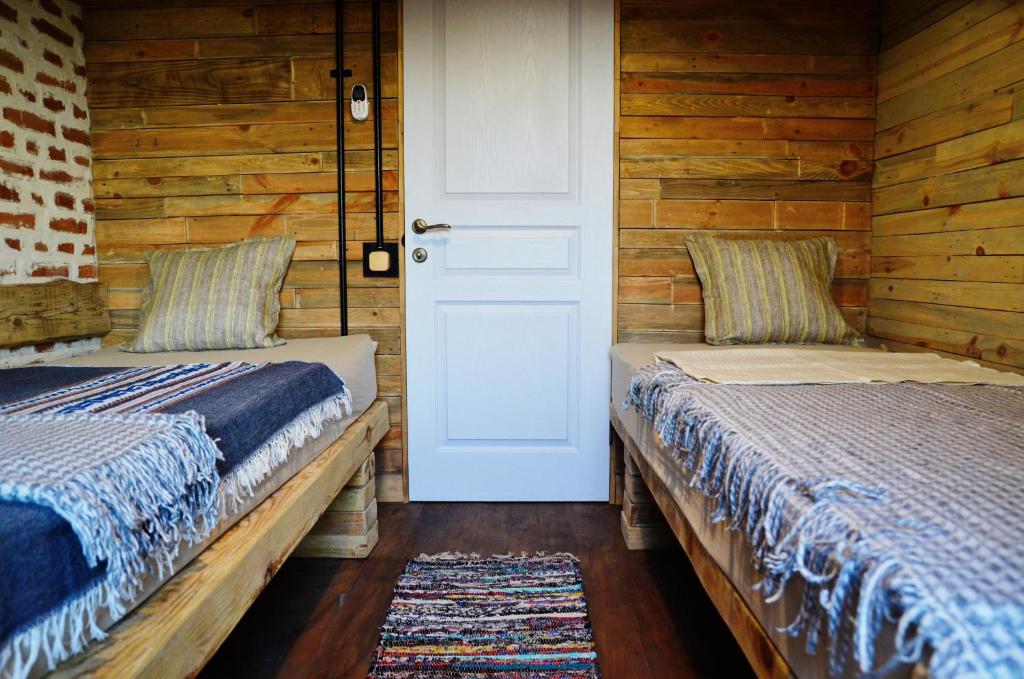 Postel nebo postele na pokoji v ubytování Rosemarino Country House