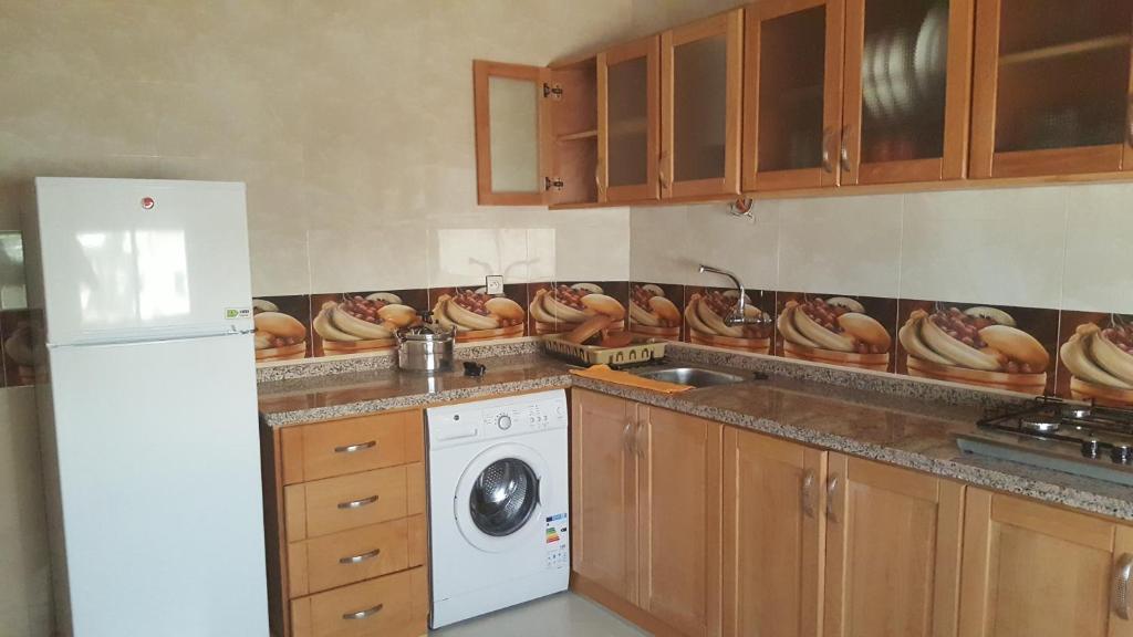 Kuchyň nebo kuchyňský kout v ubytování Oued Laou Apartment