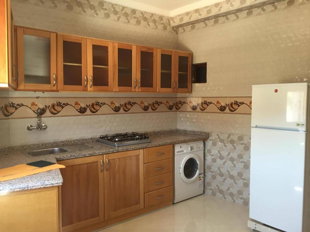 Kuchyň nebo kuchyňský kout v ubytování Oued Laou Apartment