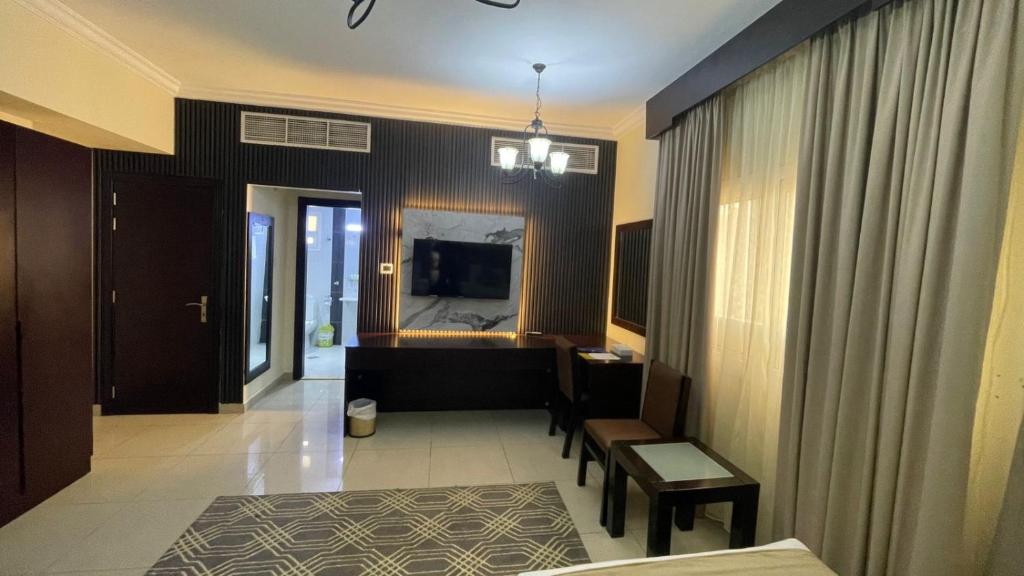 REST NIGHT HOTEL SUITES AL HAMRA