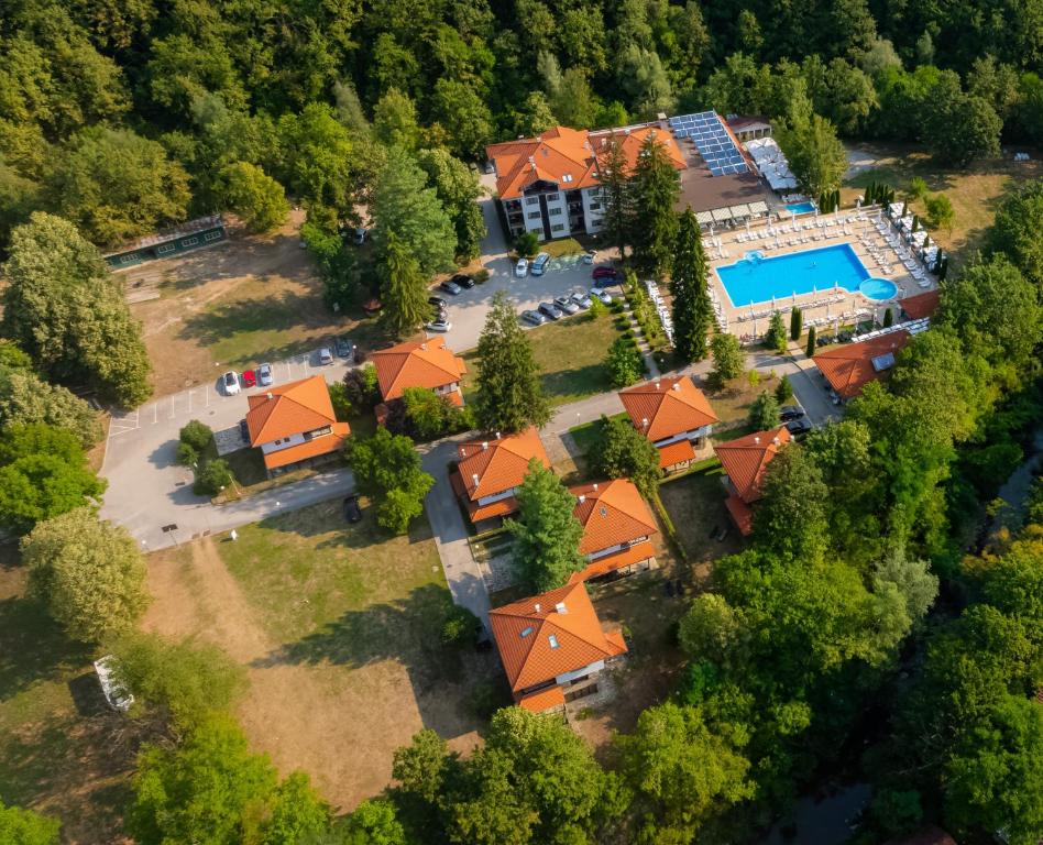an overhead view of a building with orange roofs at Ostrova Holiday Village in Beli Osŭm