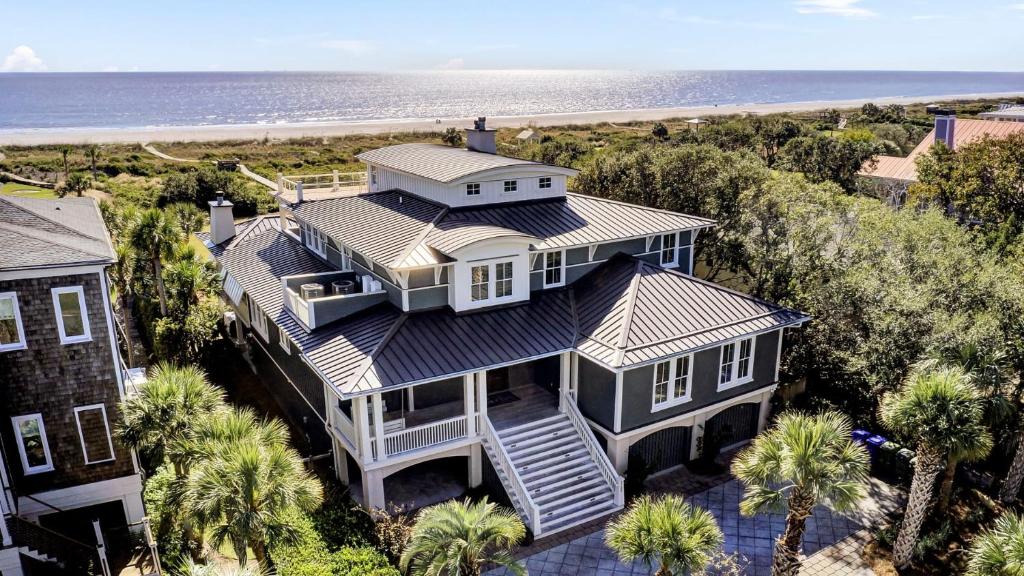 an aerial view of a house with the beach at 3100 Palm Boulevard by AvantStay Beachfront Ocean Views Private Pool in Isle of Palms