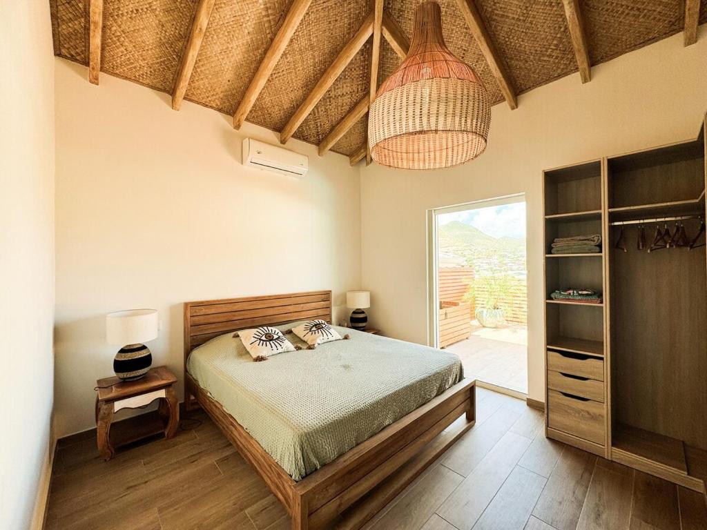 Ένα ή περισσότερα κρεβάτια σε δωμάτιο στο Villa Kiwi Private Pool Mont Vernon
