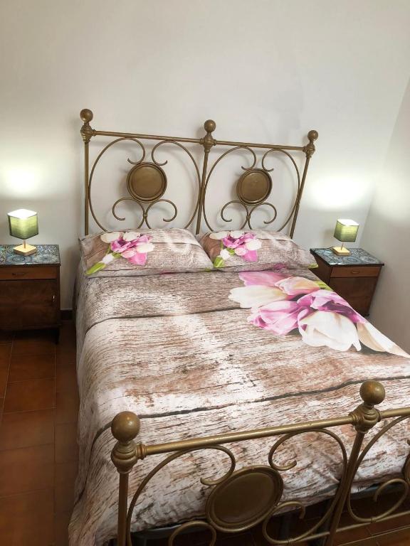 Ένα ή περισσότερα κρεβάτια σε δωμάτιο στο Casa la Rosa