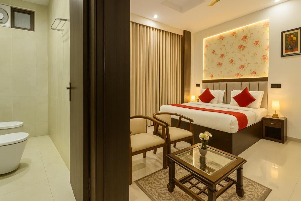Ένα ή περισσότερα κρεβάτια σε δωμάτιο στο Hotel The Casa Grand - A Four Star Luxury Hotel in Amritsar