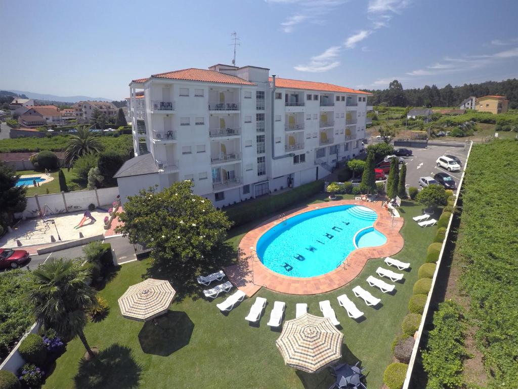 an aerial view of a hotel and a swimming pool at Hotel Turimar in Sanxenxo