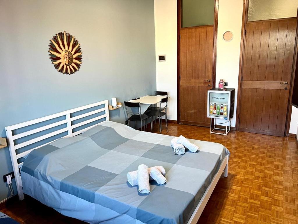 Ένα ή περισσότερα κρεβάτια σε δωμάτιο στο IEO Benvenuti da Tomas & Anna