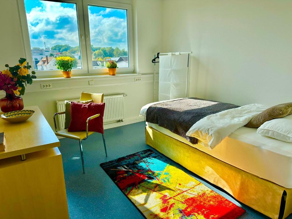 Postel nebo postele na pokoji v ubytování Donau-Iller Vermietung 24 GmbH