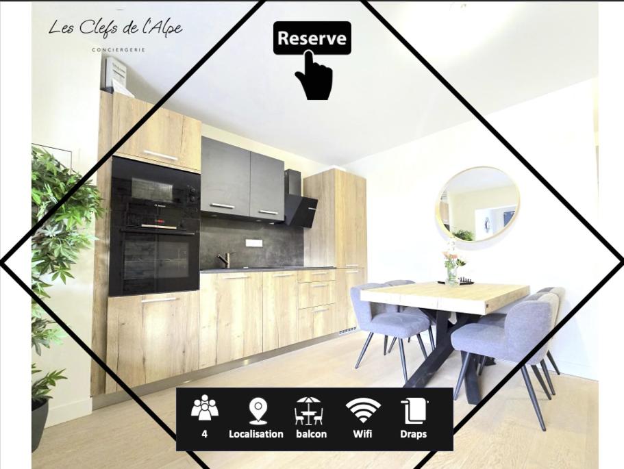 a kitchen with a table and a dining room at Incroyable T2 neuf et spacieux - Garage privé in L'Alpe-d'Huez