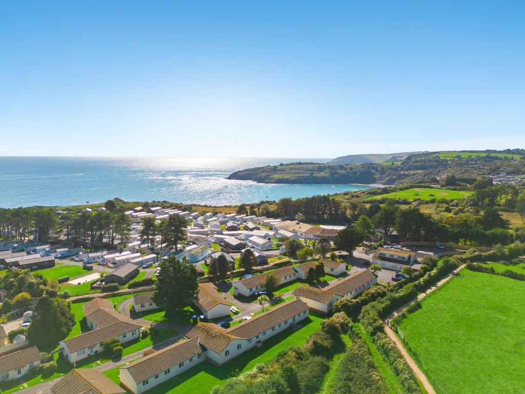 an aerial view of a town with the ocean at No 1 Cottage in Brixham