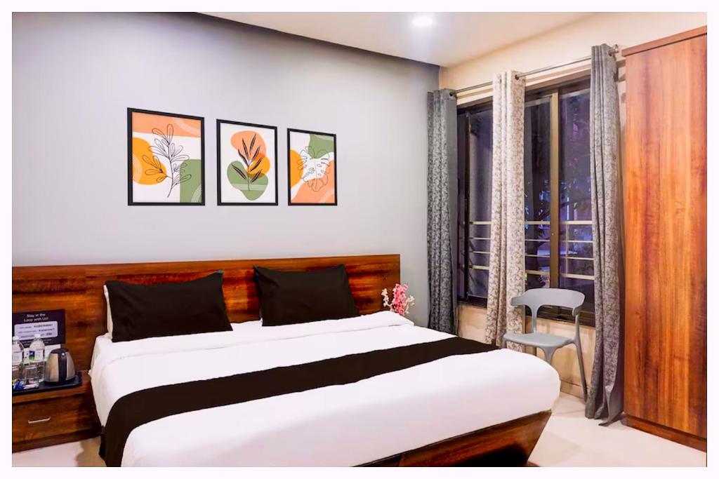 Ένα ή περισσότερα κρεβάτια σε δωμάτιο στο Hotel Daivika Residency Near Vishwanath Temple