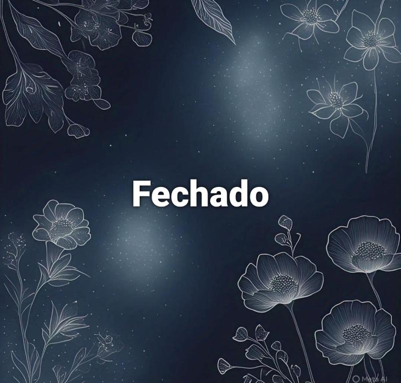 a frame with flowers on a black background at 1 quarto sem ar-condicionado in Blumenau