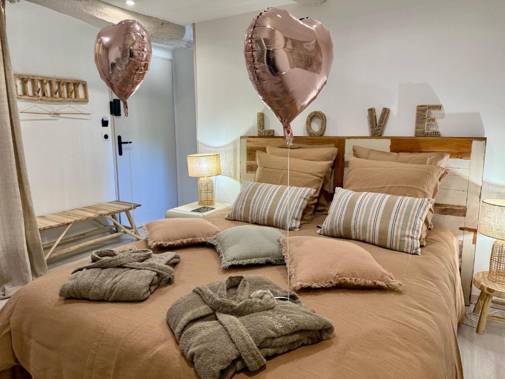 Postel nebo postele na pokoji v ubytování Le Petit Refuge