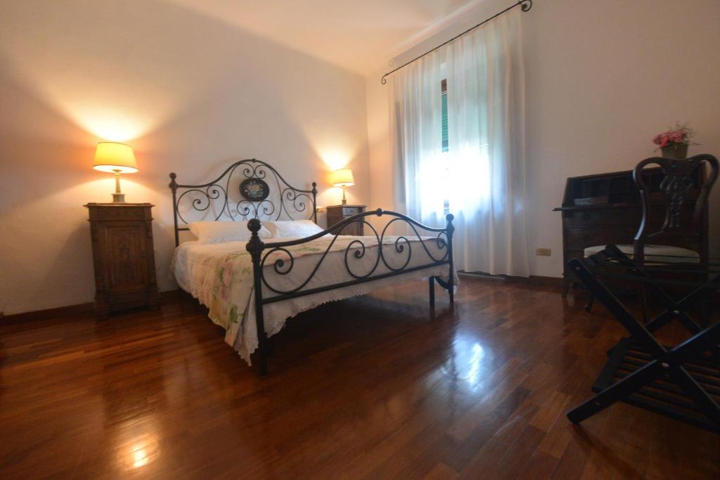 Ένα ή περισσότερα κρεβάτια σε δωμάτιο στο La Quiete Bed & Breakfast