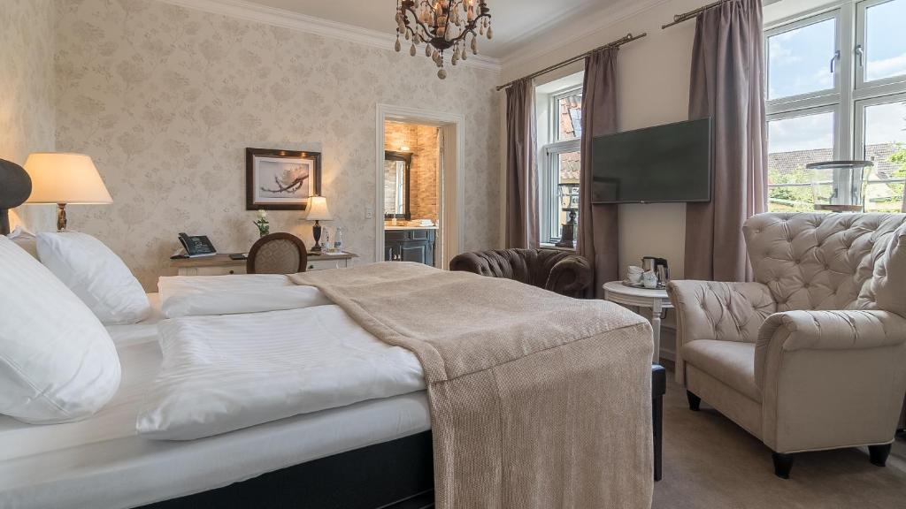 Postel nebo postele na pokoji v ubytování Bandholm Badehotel