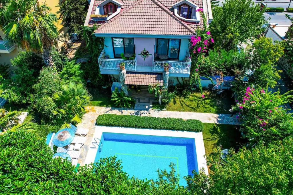 an aerial view of a house with a swimming pool at Villa Garden Island in Dalyan