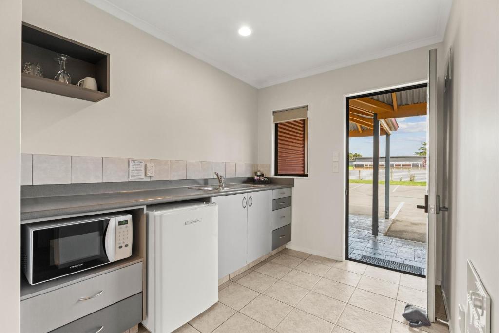 ASURE Oak Estate Motor Lodge - Resim 42