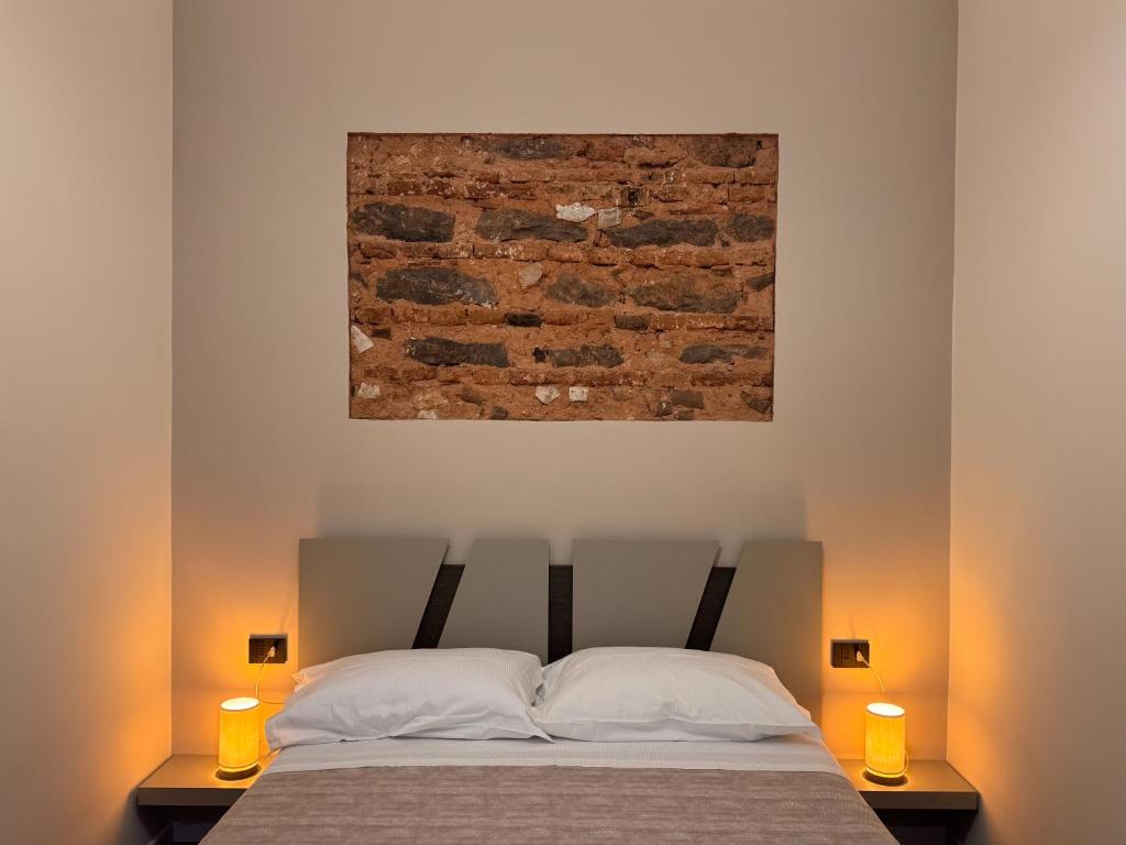 Ένα ή περισσότερα κρεβάτια σε δωμάτιο στο Casa Sarina Catania