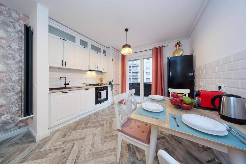 Kuchyň nebo kuchyňský kout v ubytování Anima Apartments - Coresi