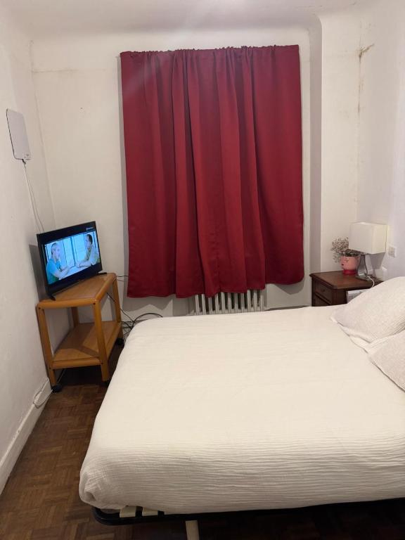 Katil atau katil-katil dalam bilik di Chambre Economy à Hendaye